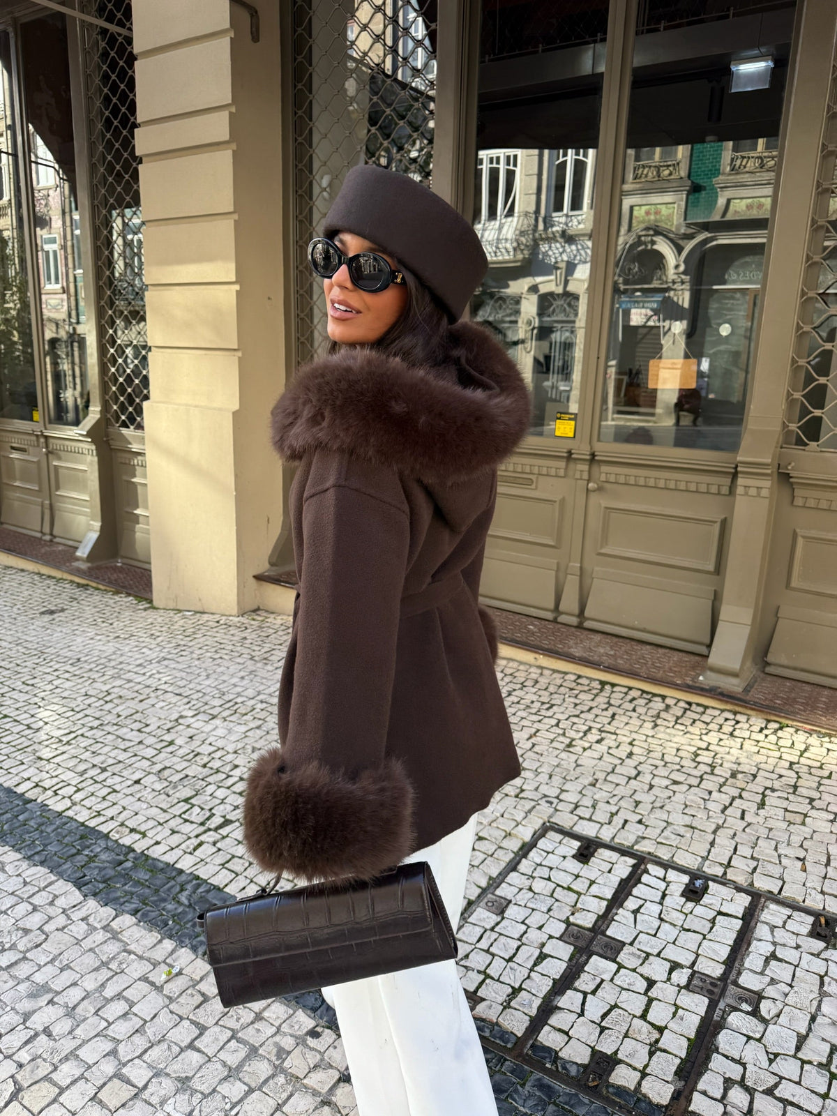 Women's brown wrap coat with wide textured collar and cuff trim