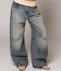 Women's washed blue wide-leg jeans with contrasting curved denim panels