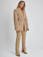 Women's belted blazer with notched lapels, long sleeves and front pockets