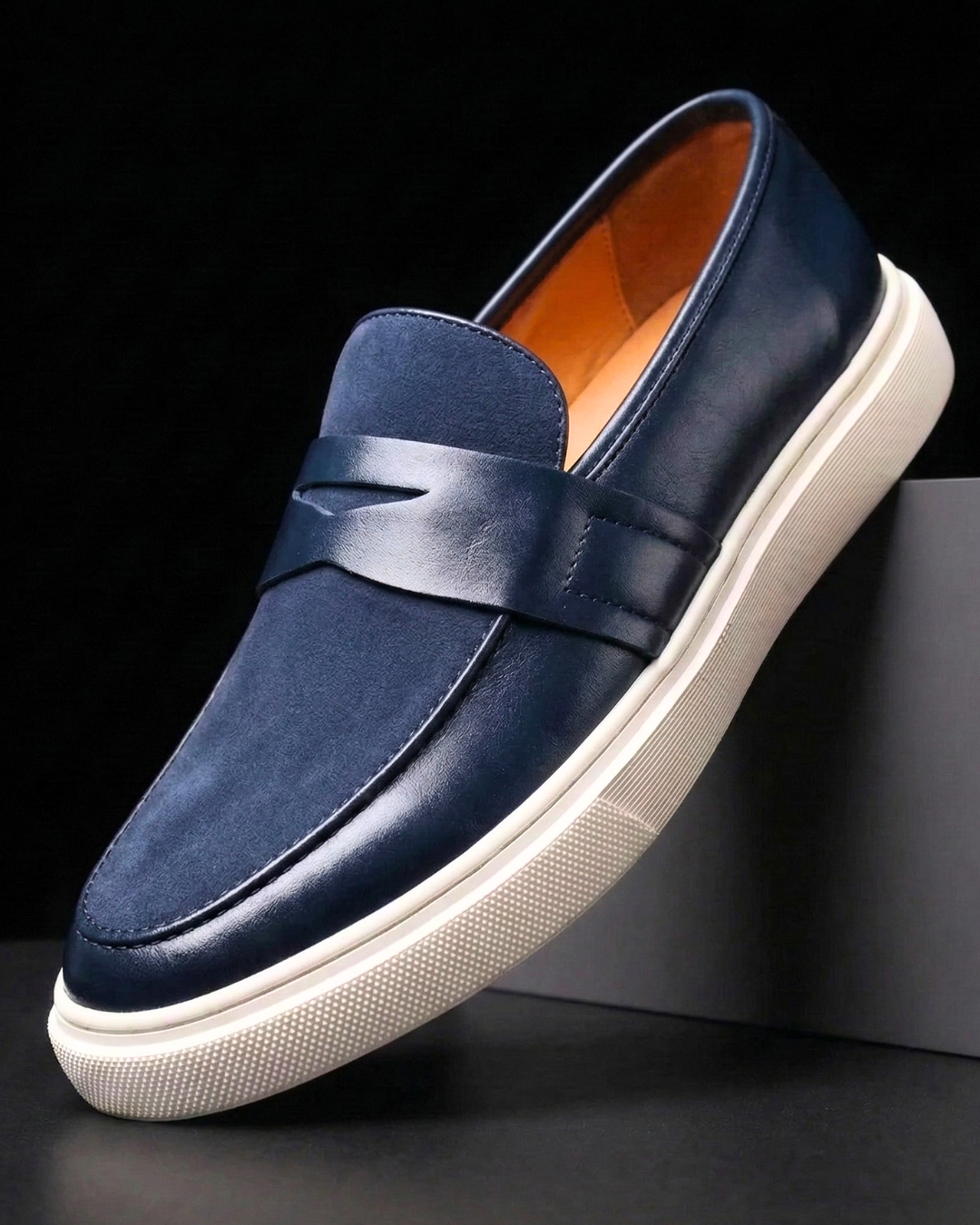 Men's penny strap slip-on loafer with almond toe and textured sole