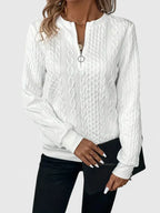 Women's textured cable knit quarter-zip sweater with long sleeves and ribbed trims