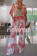 Women's red jungle print shirt and wide leg trousers set with striped detailing