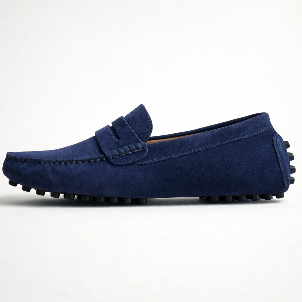 Men's slip-on penny loafers with moc toe stitching and flat treaded soles