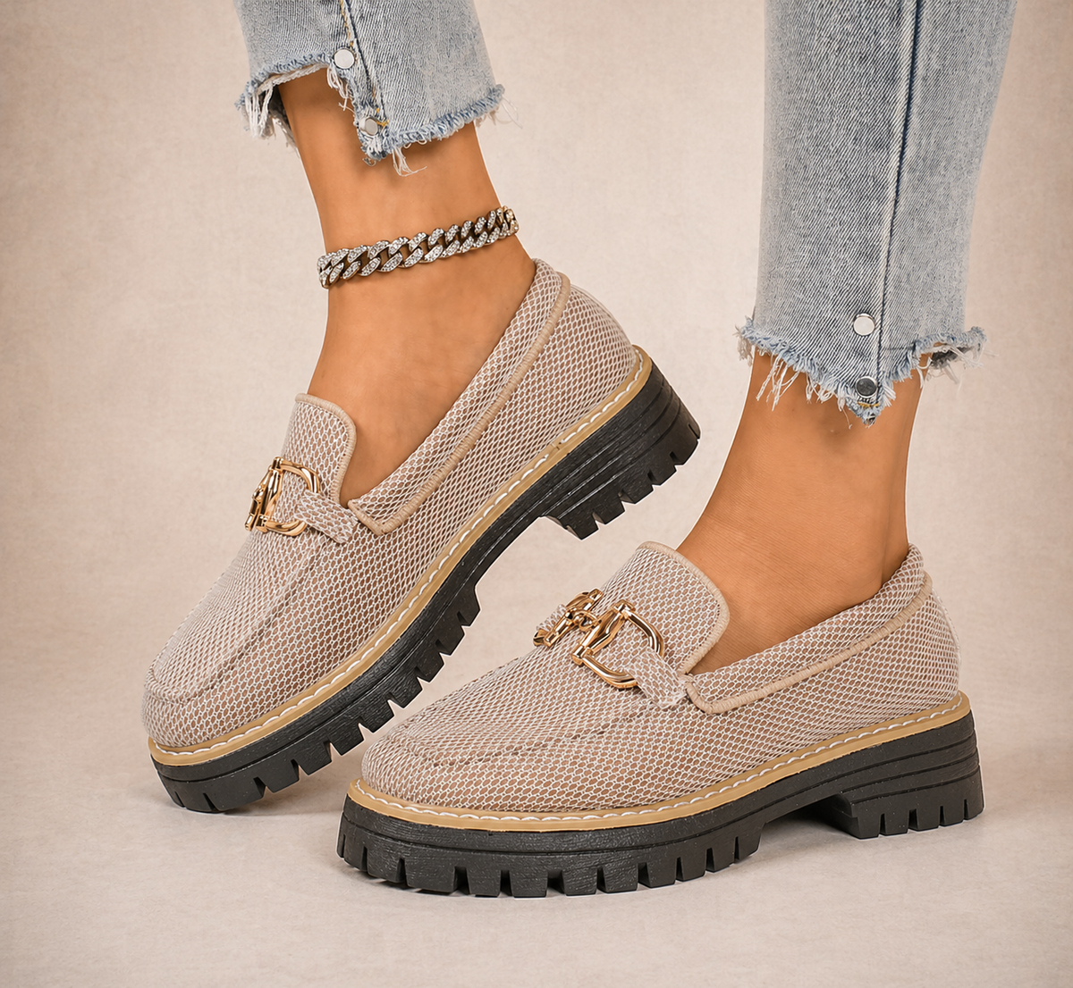 Women's beige mesh loafers with gold-tone horsebit trim and chunky black soles