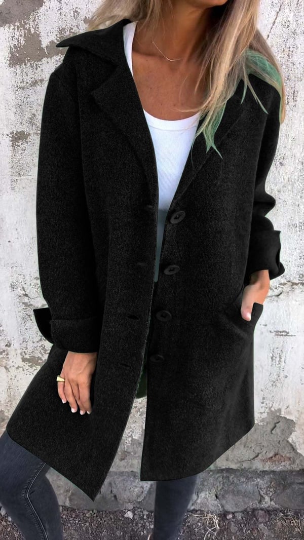 Women's longline button front coat with notched lapels and long sleeves