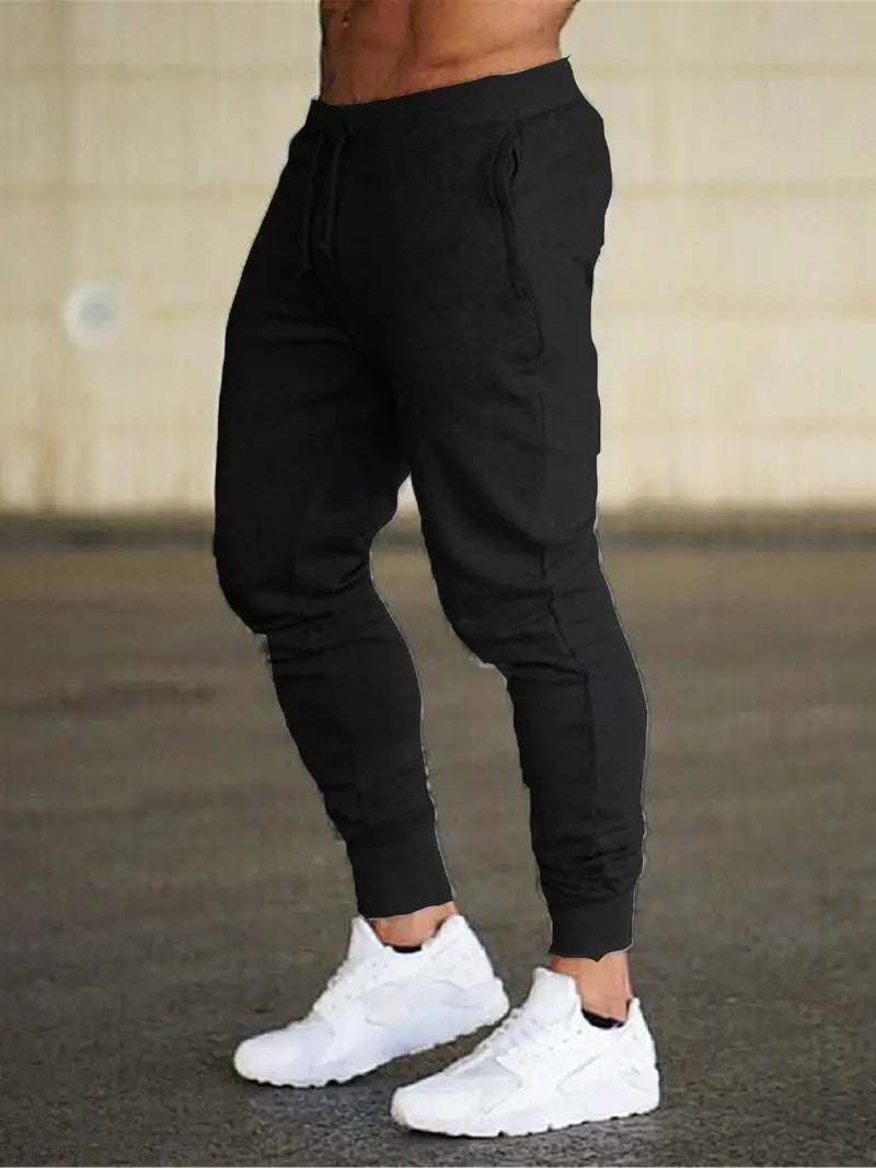 Men's tapered jogger trousers with drawstring waist and cuffed ankles