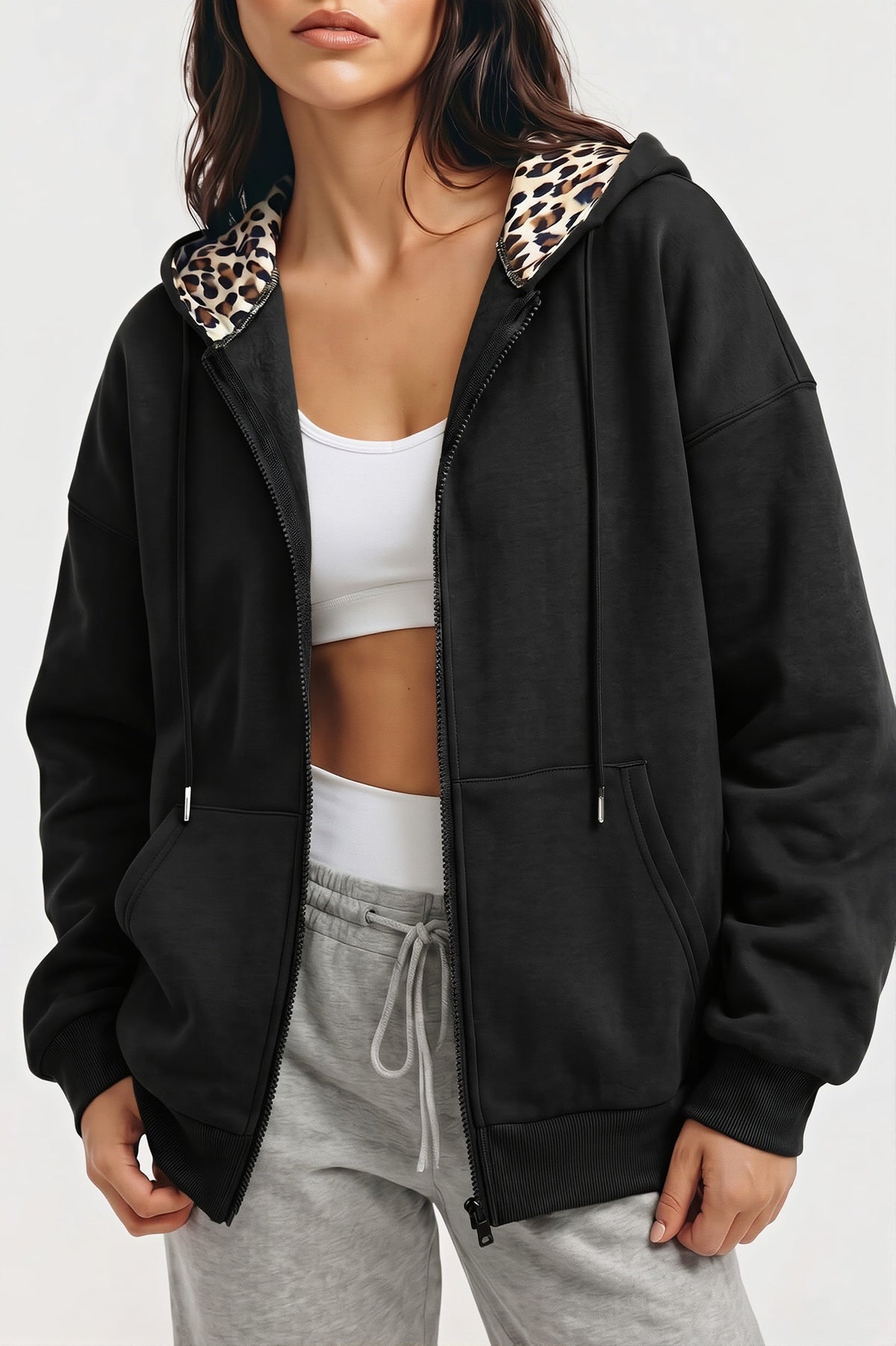 Women's oversized zip hoodie with leopard-print lined hood and front pockets