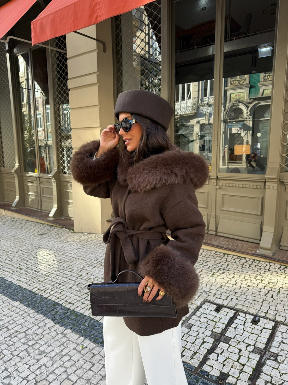 Women's brown wrap coat with wide textured collar and cuff trim