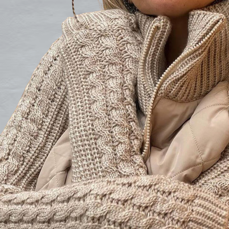 Women's quilted jacket with textured knitted sleeves, stand collar and zip front