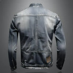 Men's blue denim jacket with mandarin collar, long sleeves and multiple zipped pockets
