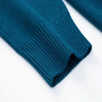 Men's plain ribbed turtleneck sweater folded in a presentation box