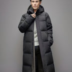 Men's black long hooded puffer coat with quilted panels and front pockets