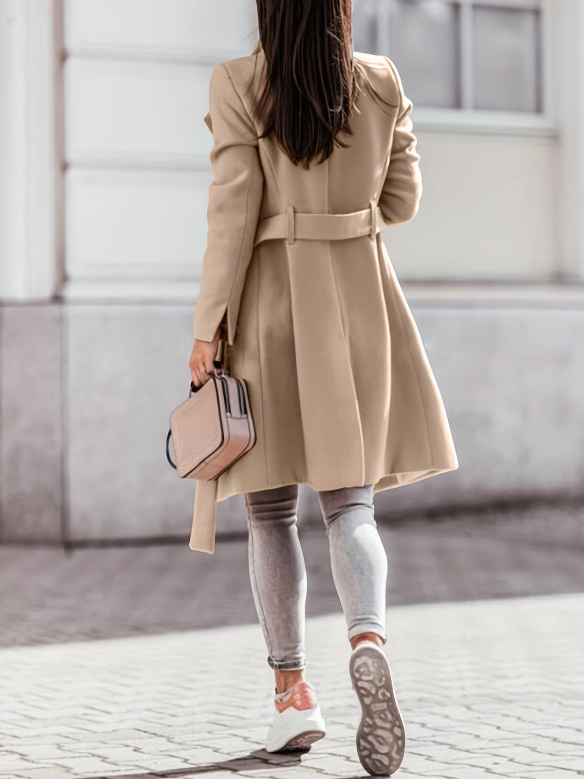 Women's khaki long trench coat with notched lapels and button front