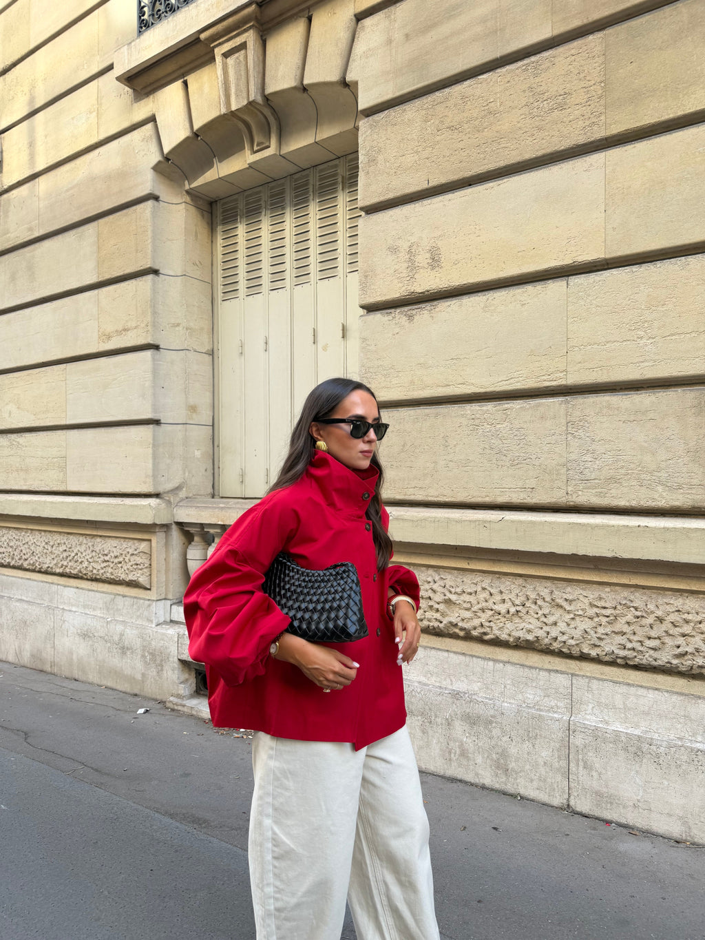 Women's red parka jacket with stand collar and button front