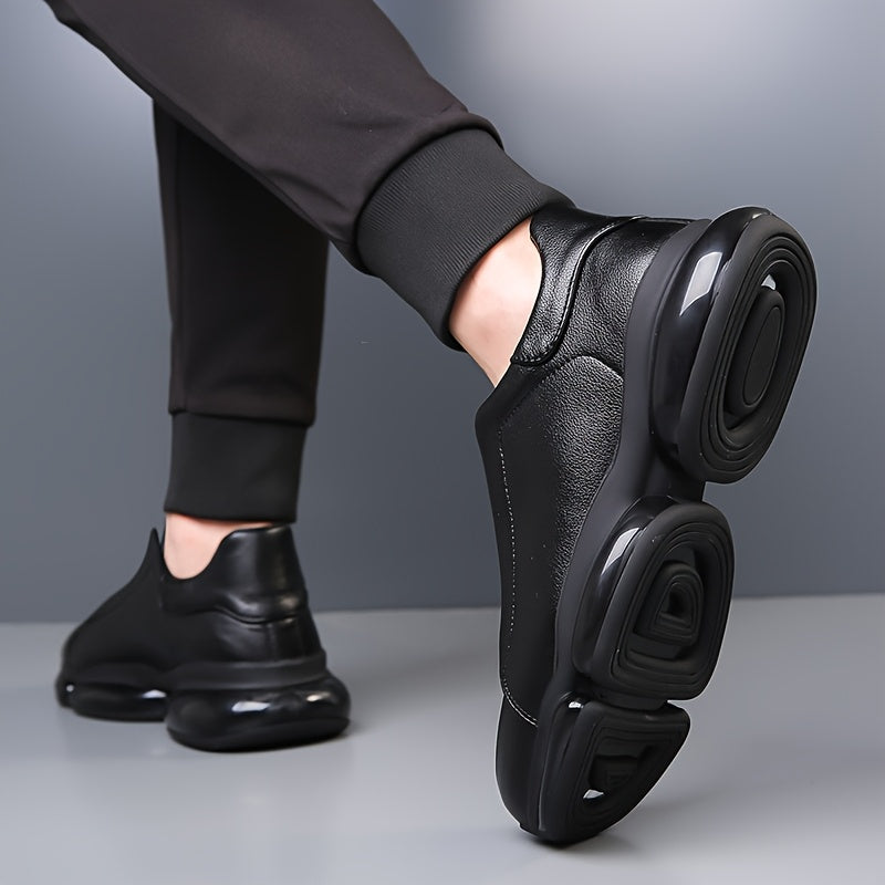 Black men's slip-on athletic trainers with chunky sculpted soles