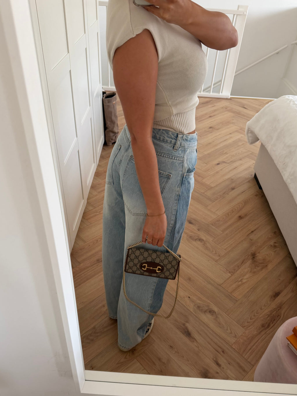 Women's light blue high-waisted wide leg jeans with darker side panels