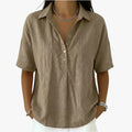 Women's oversized collared shirt blouse with short sleeves and button front