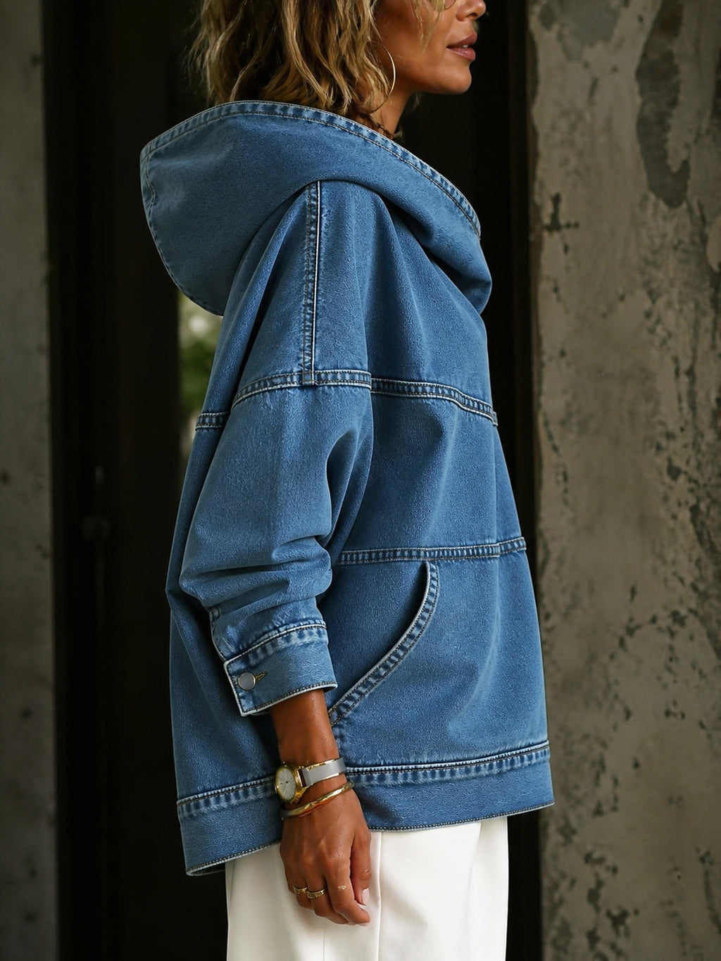 Women's blue hooded sweatshirt with long sleeves, contrast seams and front pouch pocket