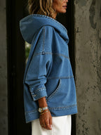 Women's blue hooded sweatshirt with long sleeves, contrast seams and front pouch pocket