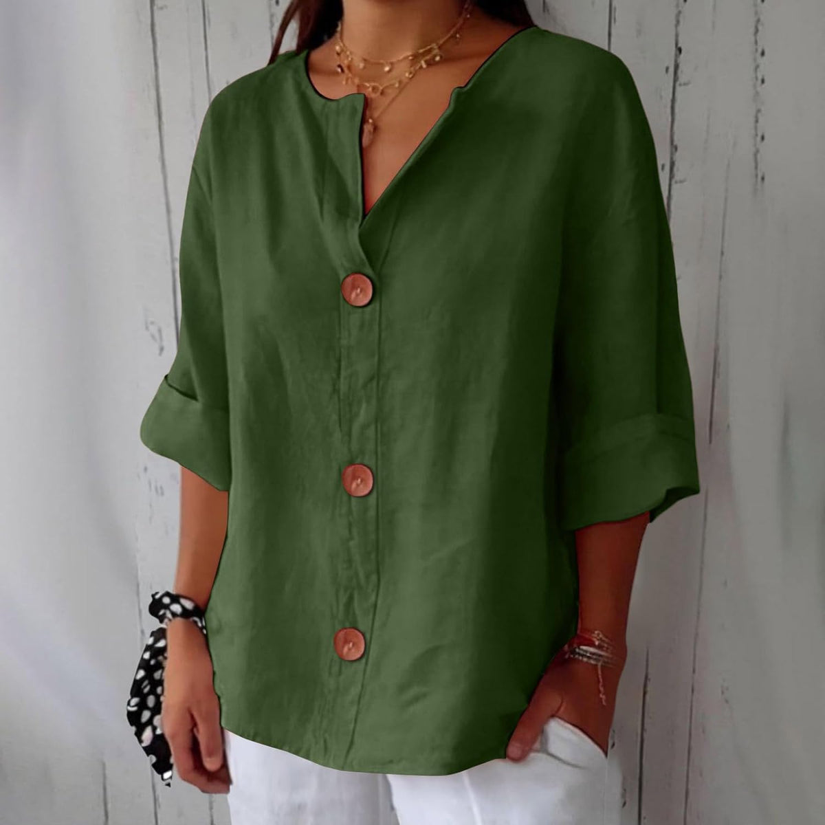 Women's plain V-neck shirt with front buttons and three-quarter sleeves