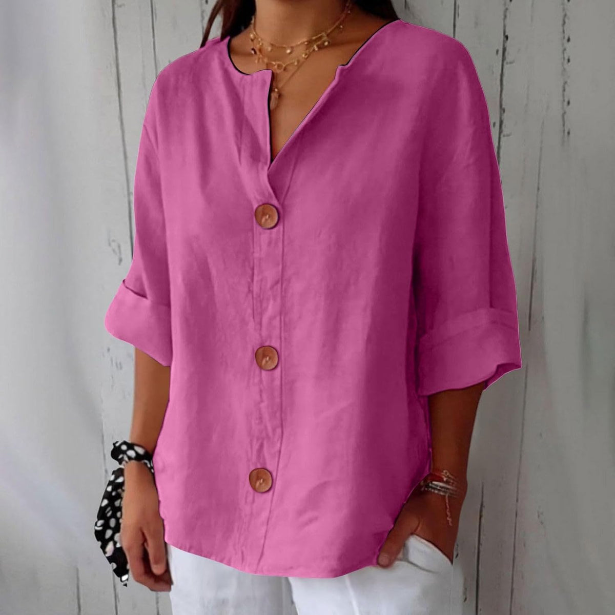 Women's plain V-neck shirt with front buttons and three-quarter sleeves