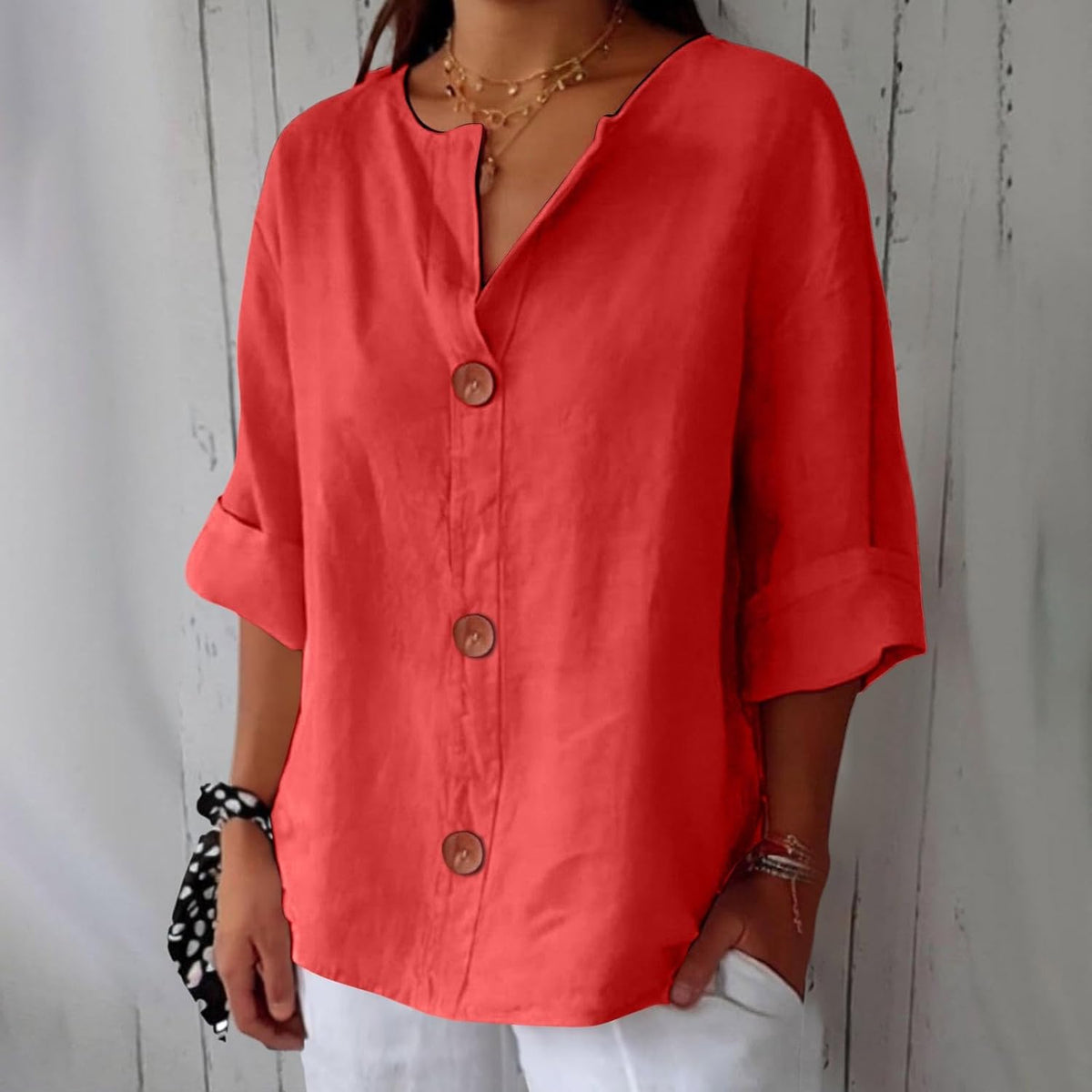 Women's plain V-neck shirt with front buttons and three-quarter sleeves
