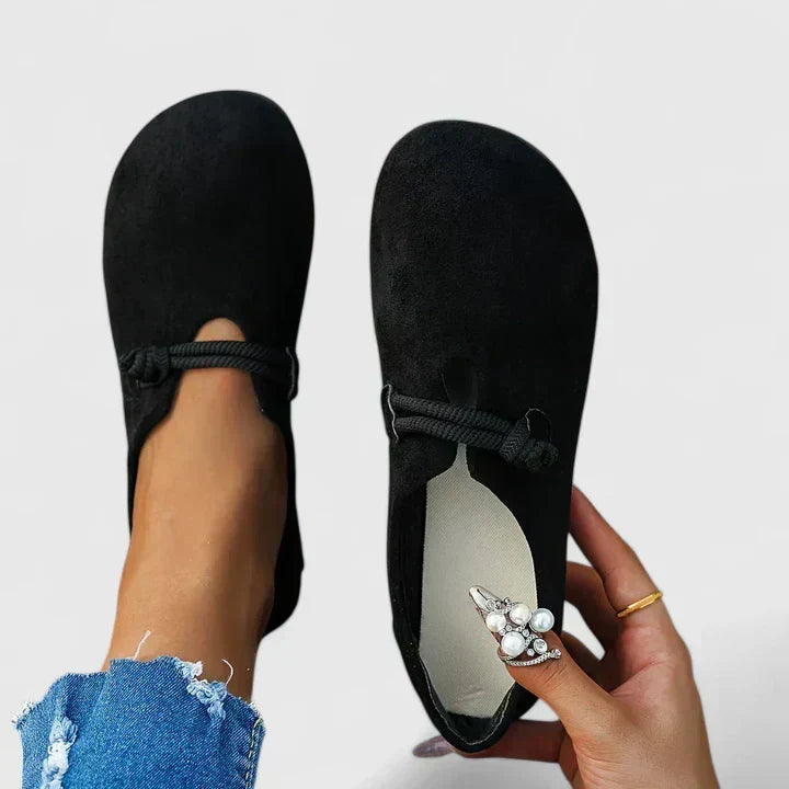 Women's slip-on loafers with rounded toes, rope trim and flat soles
