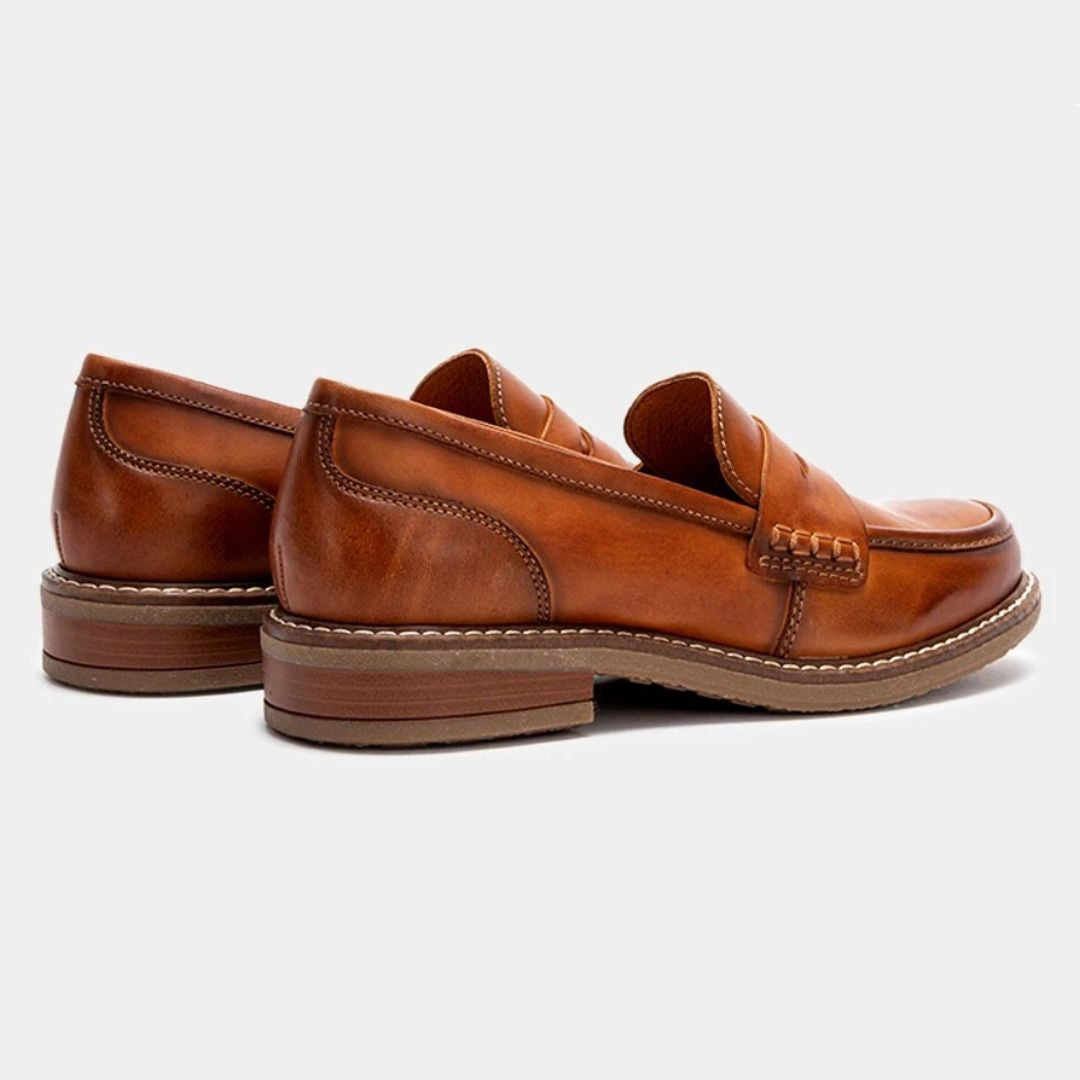 Men's slip-on penny loafers with rounded toes, stitched soles and low flat heels