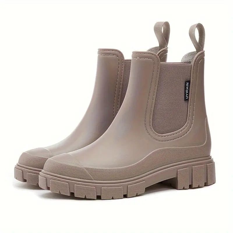 Women's Chelsea boots with elastic side panels and chunky textured soles