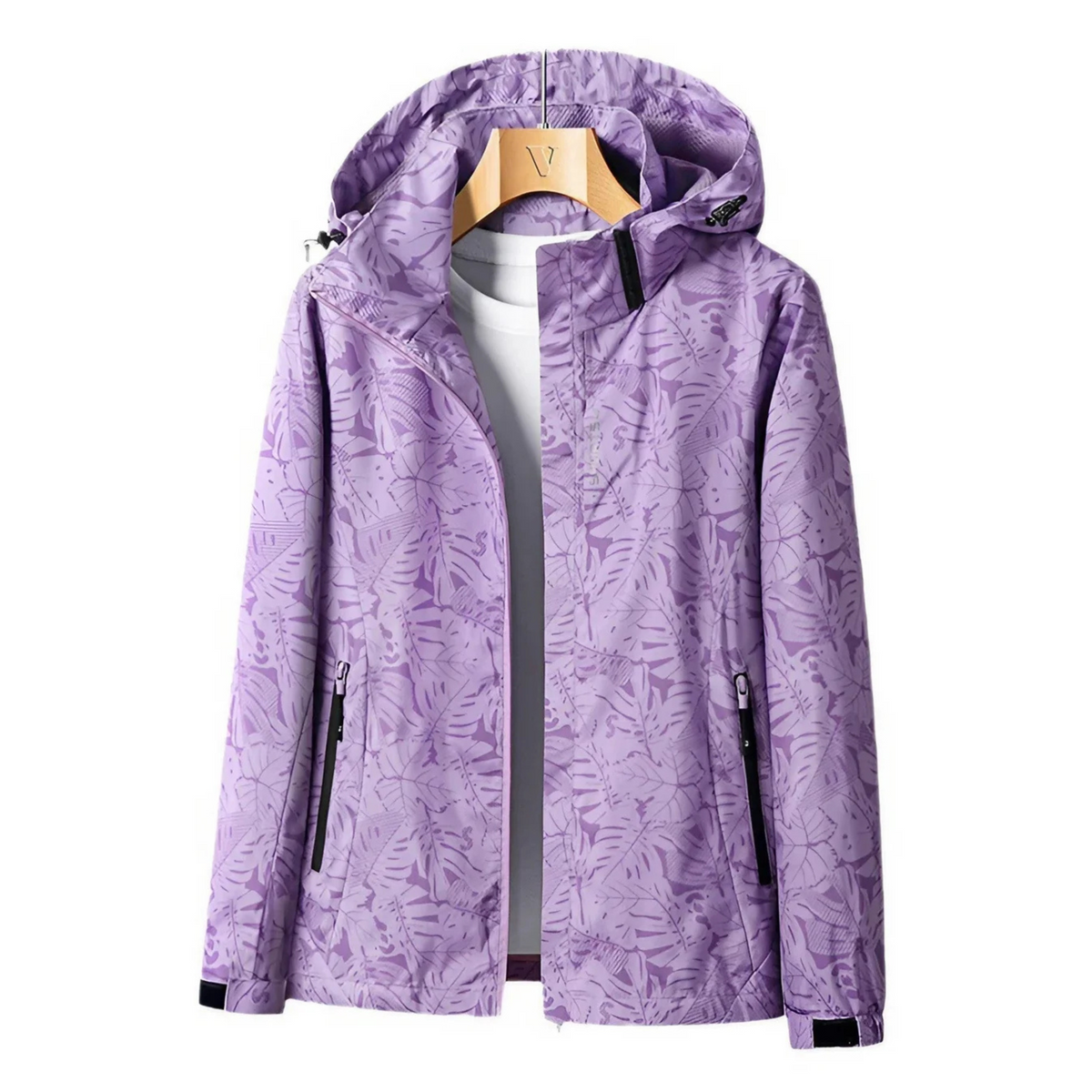 Women's hooded abstract patterned windbreaker jacket with long sleeves and zipped pockets