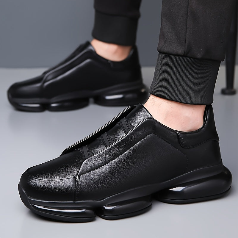 Black men's slip-on athletic trainers with chunky sculpted soles