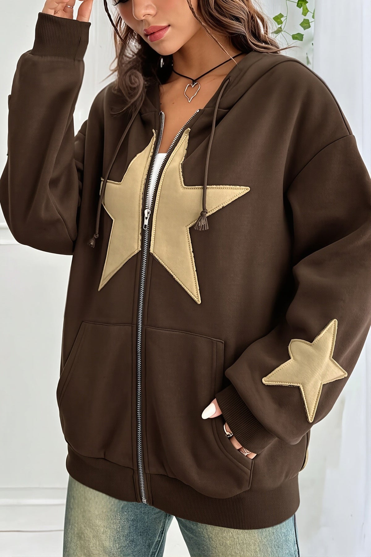 Women's oversized zip hoodie with hood and contrast star appliques
