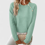 Women's crew neck knitted jumper with long sleeves and upper front button detail