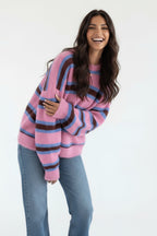 Women's pink striped knit jumper with crew neck and long sleeves