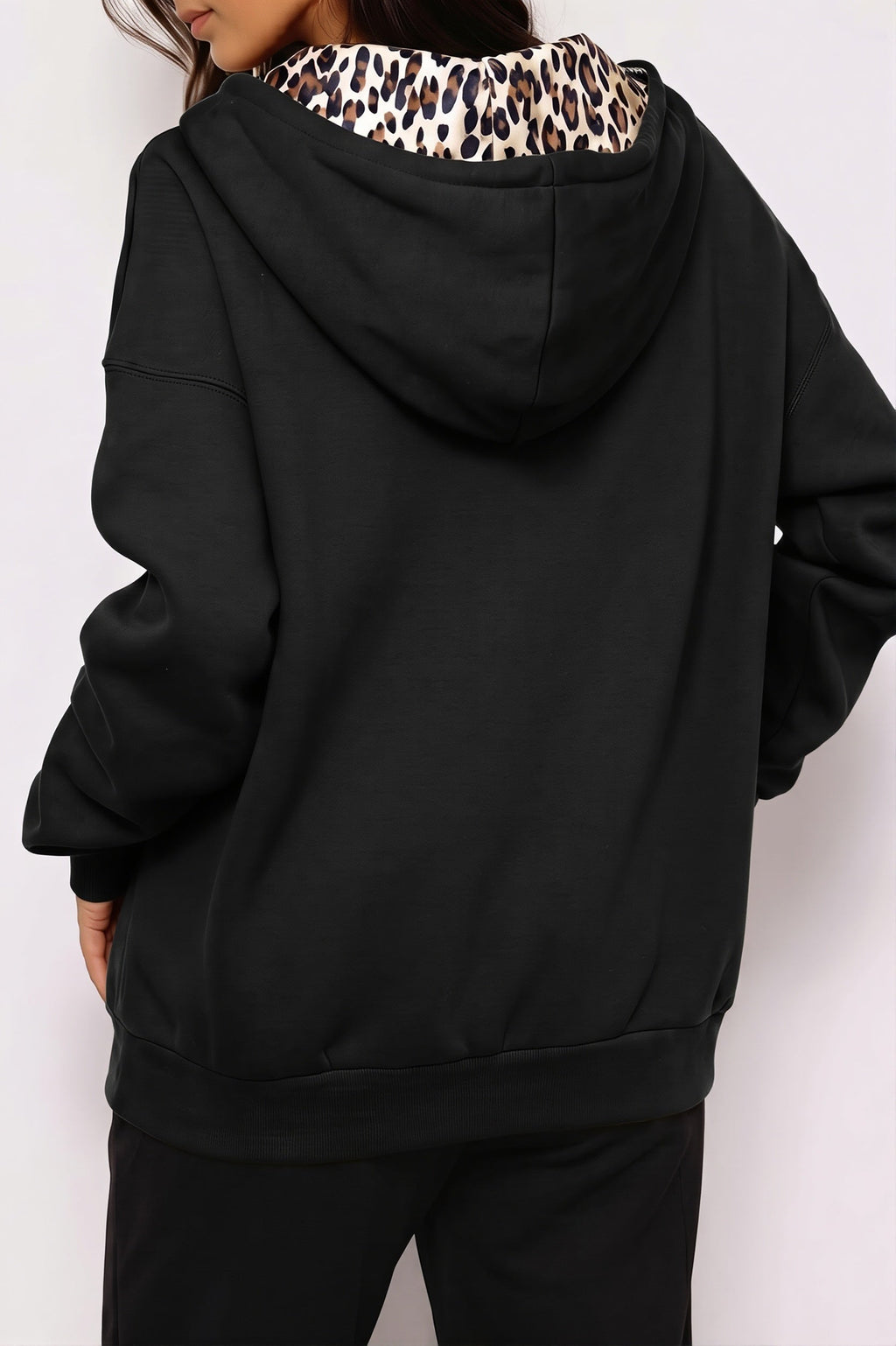 Women's oversized zip hoodie with leopard-print lined hood and front pockets