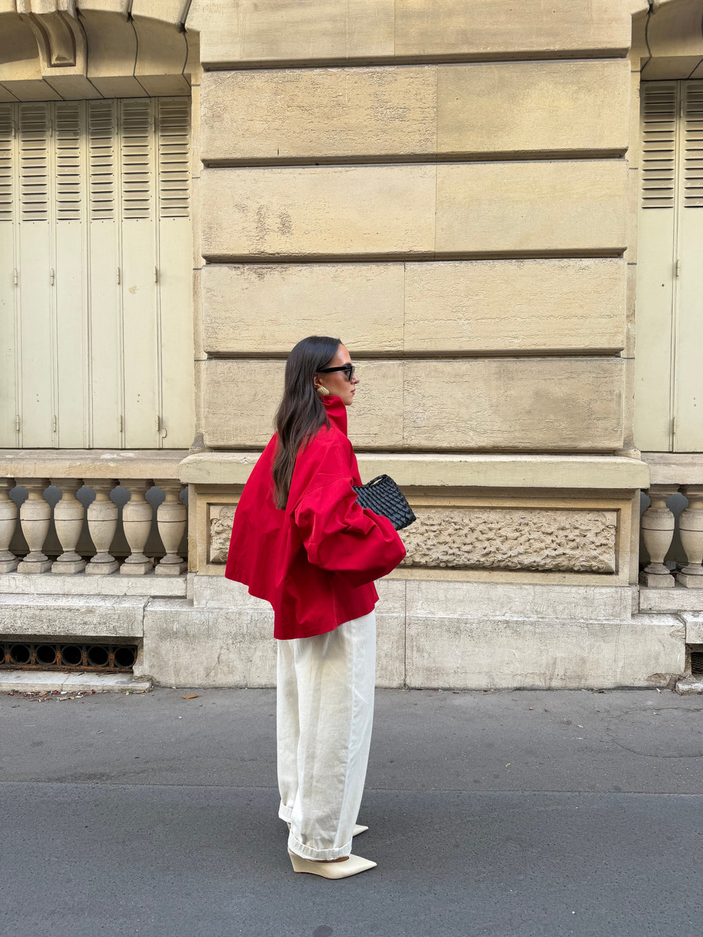 Women's red parka jacket with stand collar and button front