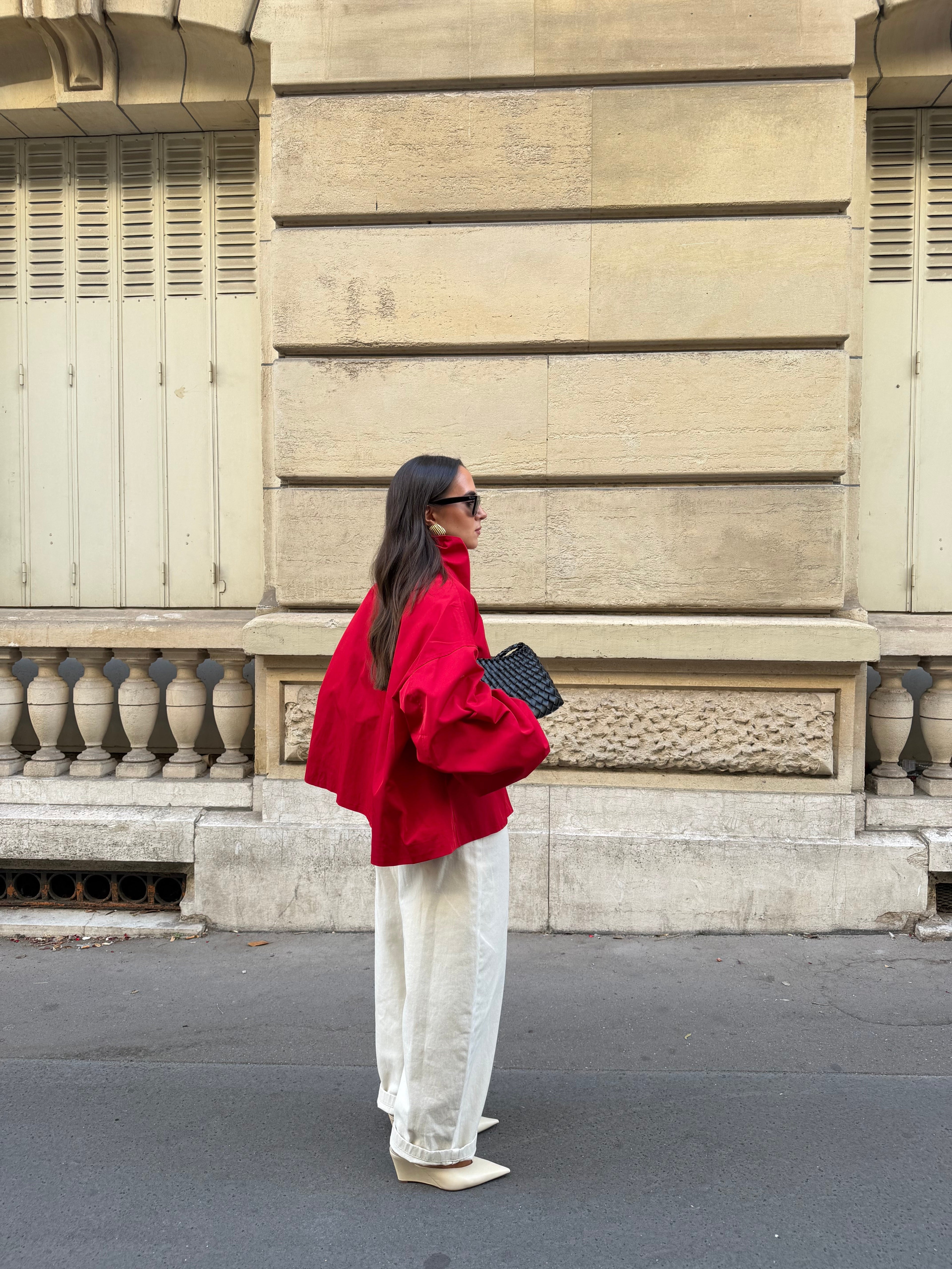 Women's red parka jacket with stand collar and button front
