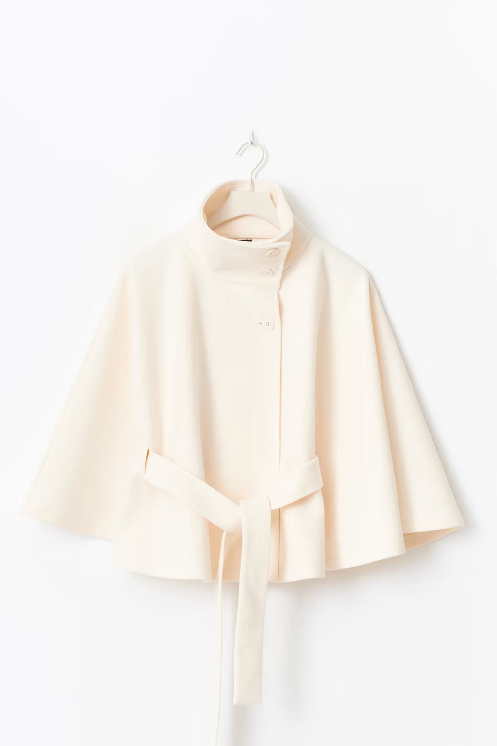 Women's cape coat with high collar, button front and tied waist belt