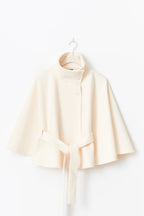 Women's cape coat with high collar, button front and tied waist belt