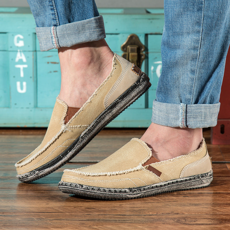 Casual slip-on loafers with rounded toes, stitched uppers and flat textured soles