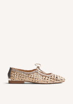 Gold woven ballet flats with ankle tie straps and low heels