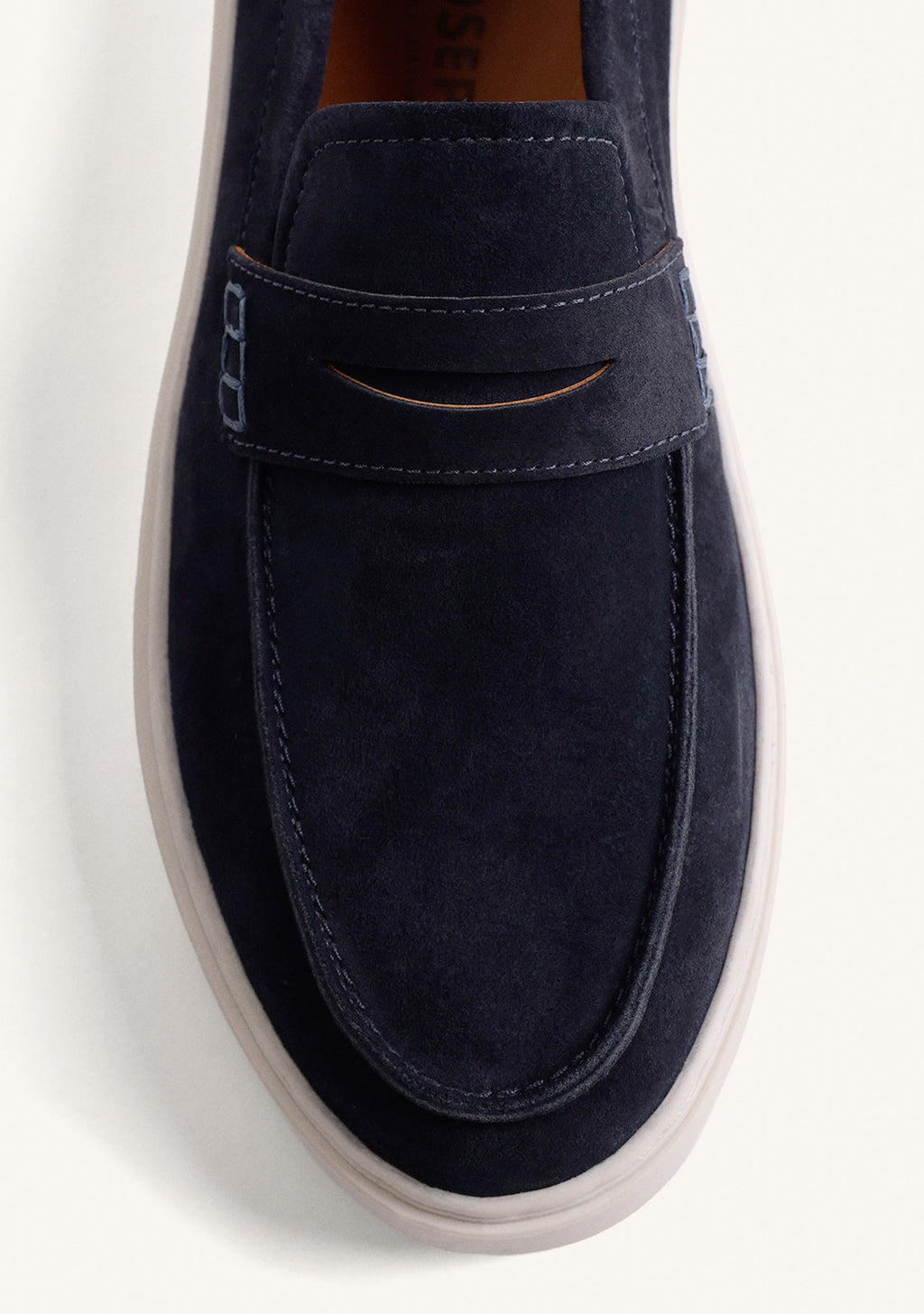 Men's navy loafers with penny strap and off-white platform sole