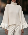 Women's beige roll neck jumper with long sleeves and layered ruffle cuffs