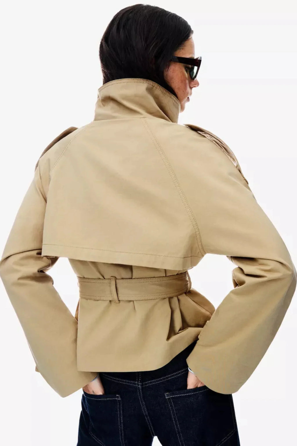 Women's cropped trench jacket with high collar, buttons, belt and shoulder tabs