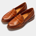 Men's slip-on penny loafers with rounded toes, stitched soles and low flat heels