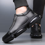 Black men's slip-on athletic trainers with chunky sculpted soles