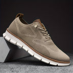 Textured lace-up trainers with rounded toe and flat white sole