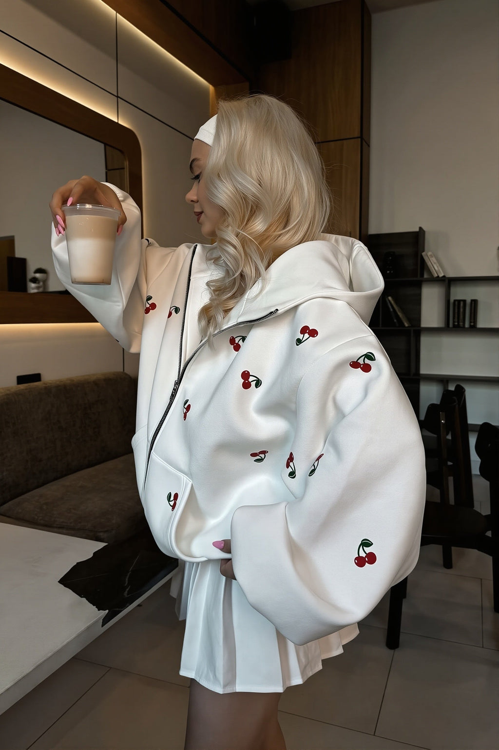 Women's oversized zip hoodie with scattered cherry print and front kangaroo pocket