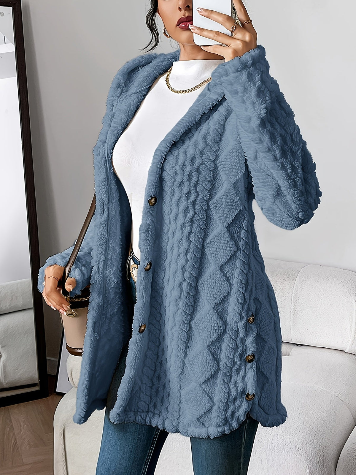 Women's hooded textured cardigan with long sleeves, button front and side pockets