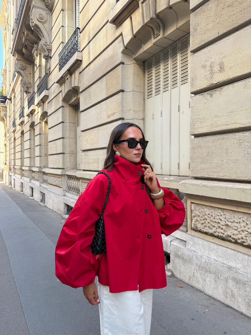 Women's red parka jacket with stand collar and button front